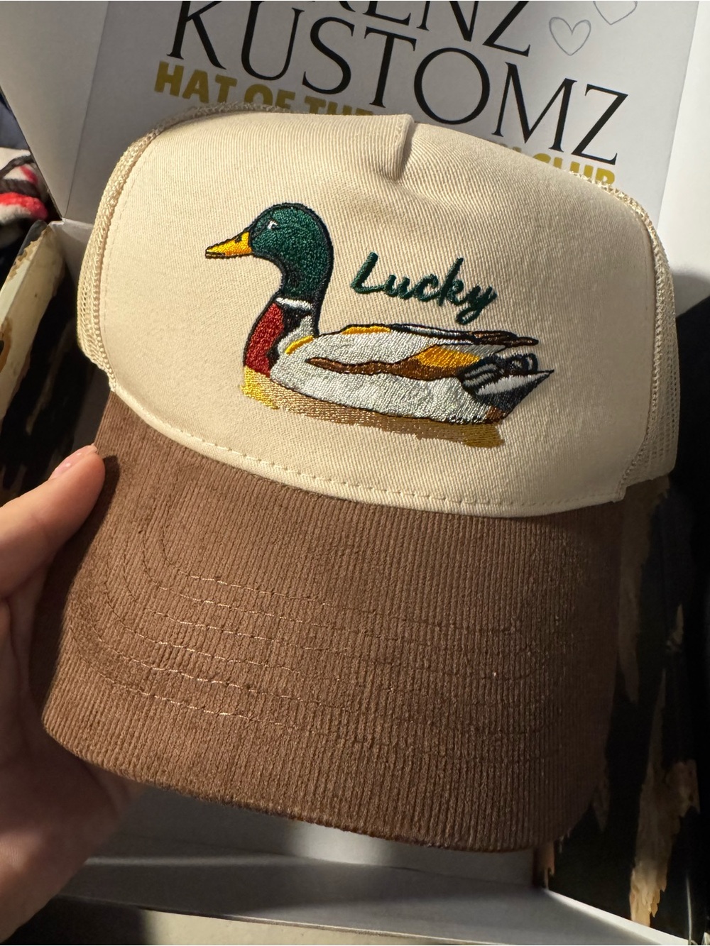 Lucky Mallard Embroidered Trucker Hat - Cream and Brown